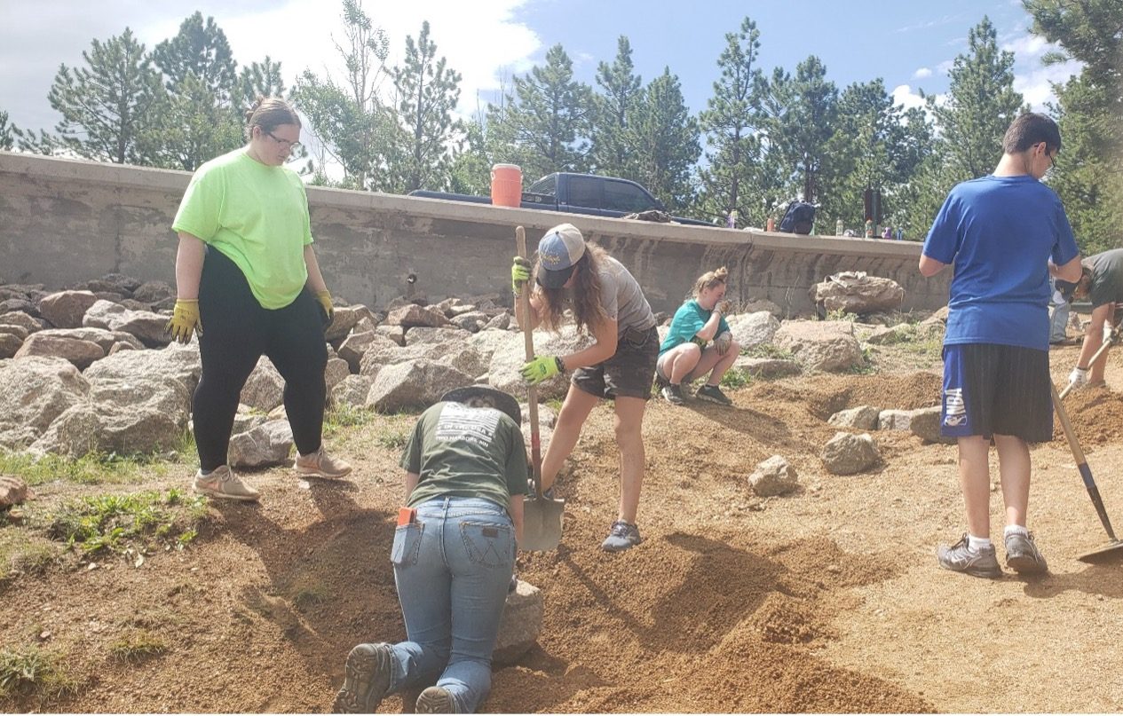 Image of youth volunteering for church.